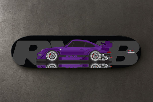 Purple RWB Porsche car design on a skateboard deck with 'RWB' branding.