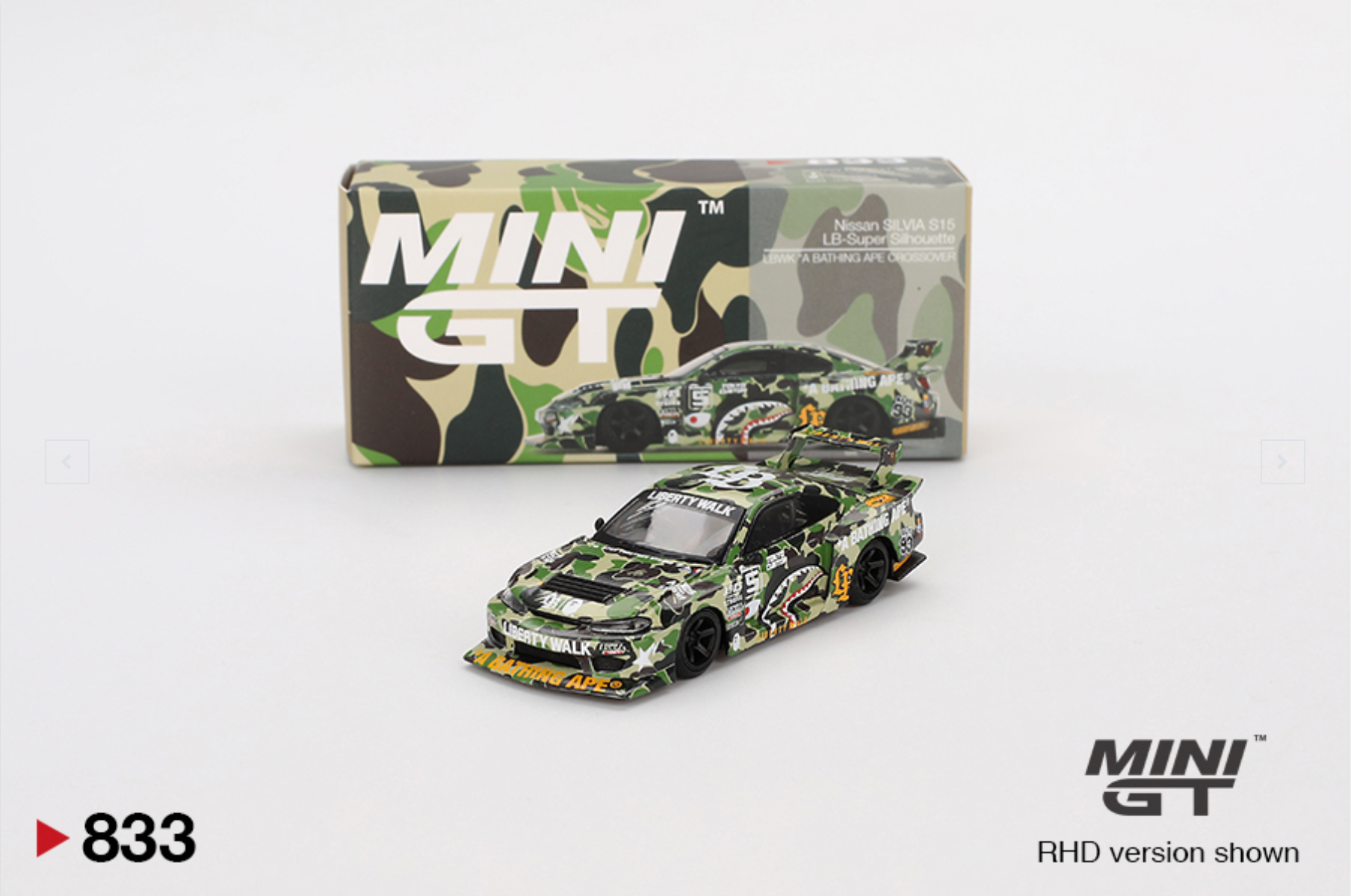 Mini GT model car with camouflage design and packaging on a white background