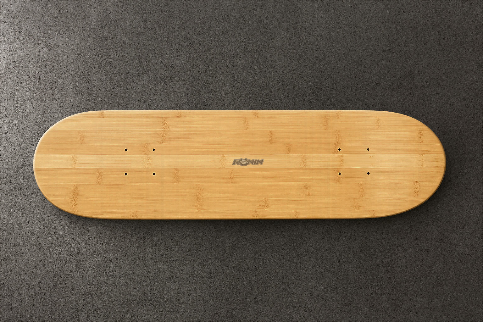 Wooden skateboard deck on a gray background