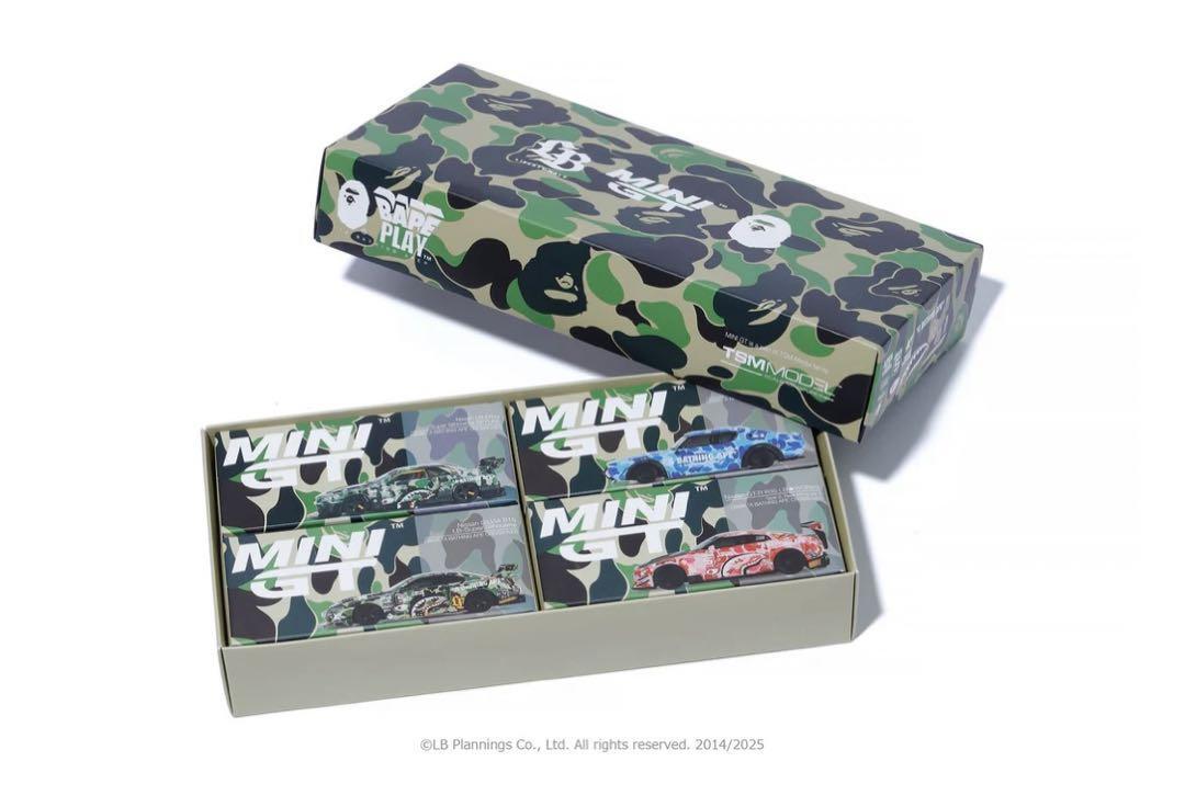 Box of mini cars with camouflage design and visible branding on a white background