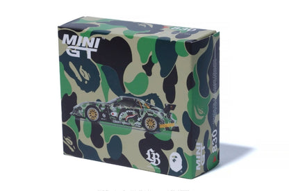 Camouflage-patterned box with 'MINI GT' branding and a car illustration on a white background
