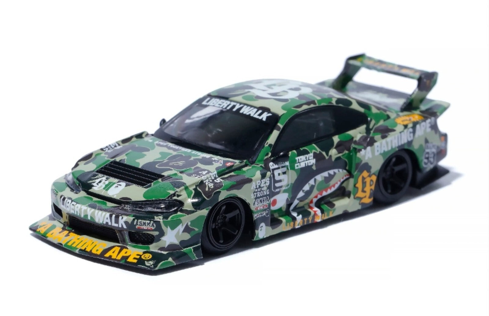 Camouflage model car with branding on a white background